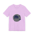 A black cat with piercing yellow eyes sits in playful silhouette on a mystery-themed t-shirt