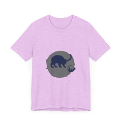 A black cat with piercing yellow eyes sits in playful silhouette on a mystery-themed t-shirt