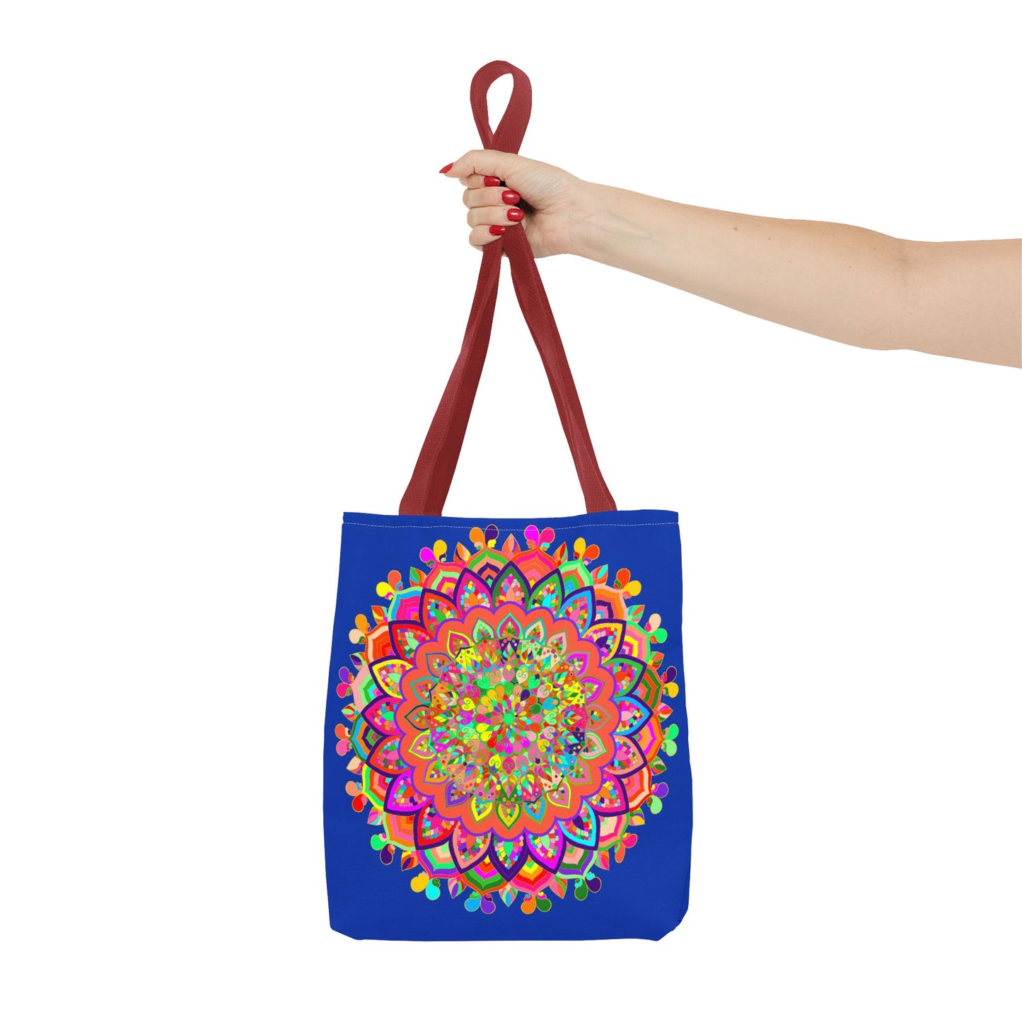 A dark blue tote bag featuring a colorful mandala art design