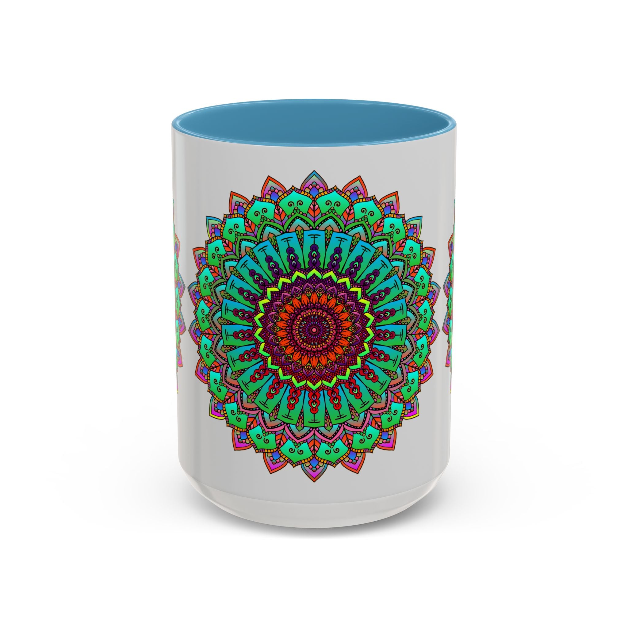 A light grey ceramic mug with a colorful mandala design on it