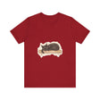 An adorable black cat curled up sleeping peacefully, depicted in watercolor on a soft t-shirt