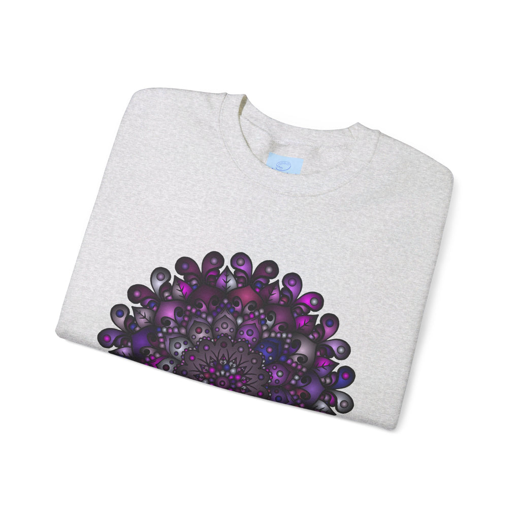 Soft and cozy unisex crewneck sweatshirt featuring a vibrant purple mandala design