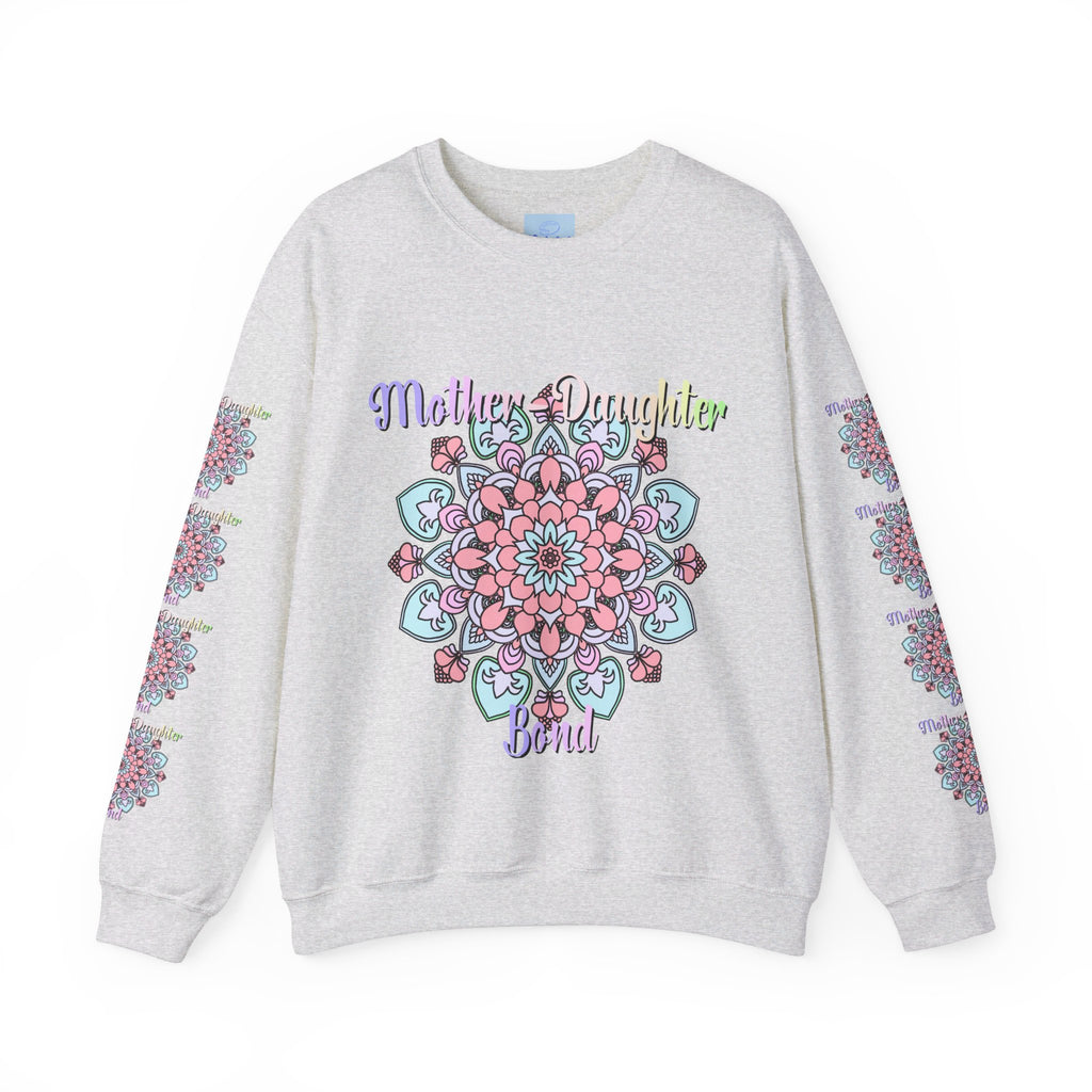 Mother and daughter holding hands and smiling, wearing matching 'Mother-Daughter Bond' Unisex Heavy Blend™ Crewneck Sweatshirts, the perfect birthday gift for mom