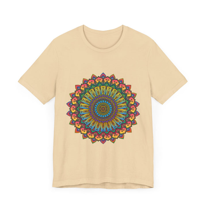 A close-up image of a vibrant and intricate mandala meditation tee in various shades of blue, pink, and purple, showcasing its beautiful design and colors