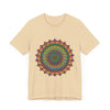 A close-up image of a vibrant and intricate mandala meditation tee in various shades of blue, pink, and purple, showcasing its beautiful design and colors