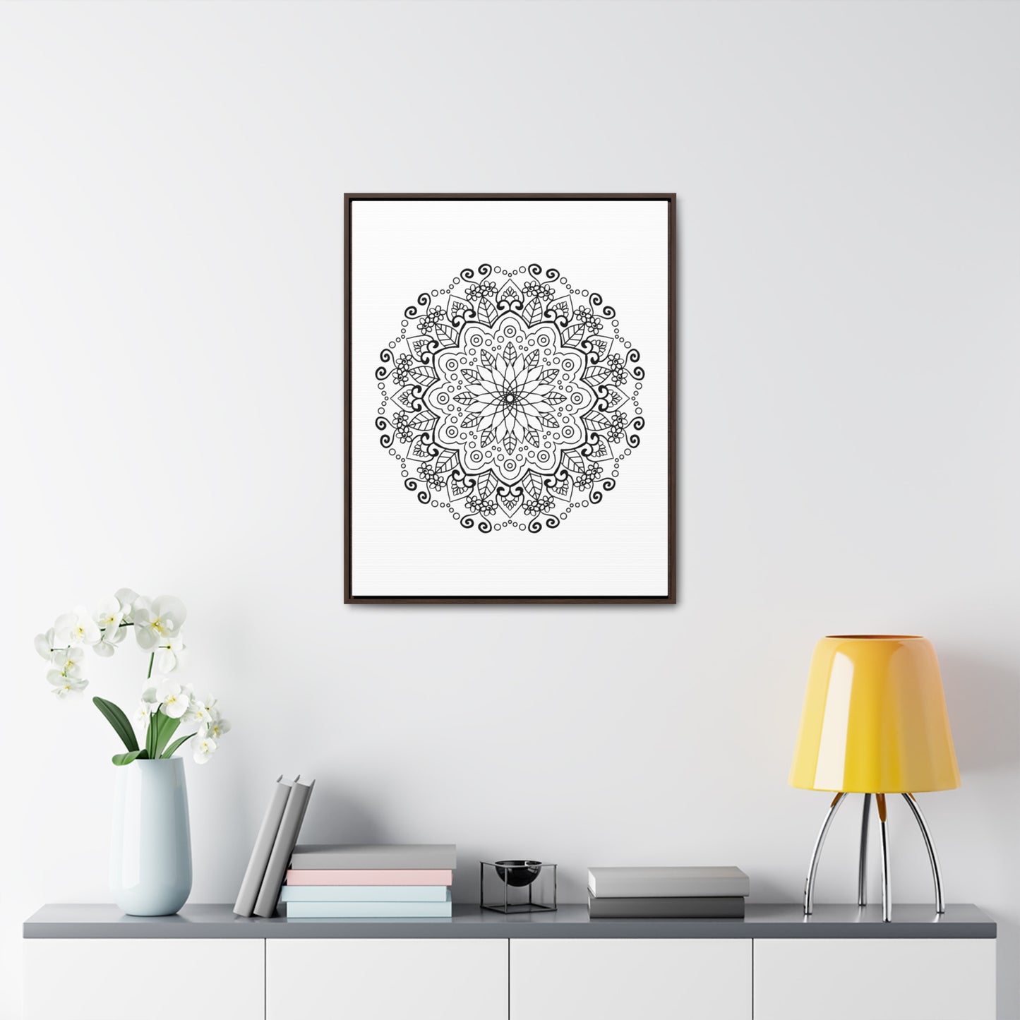 Beautiful black and white handmade mandala art displayed on gallery canvas wraps in a vertical frame