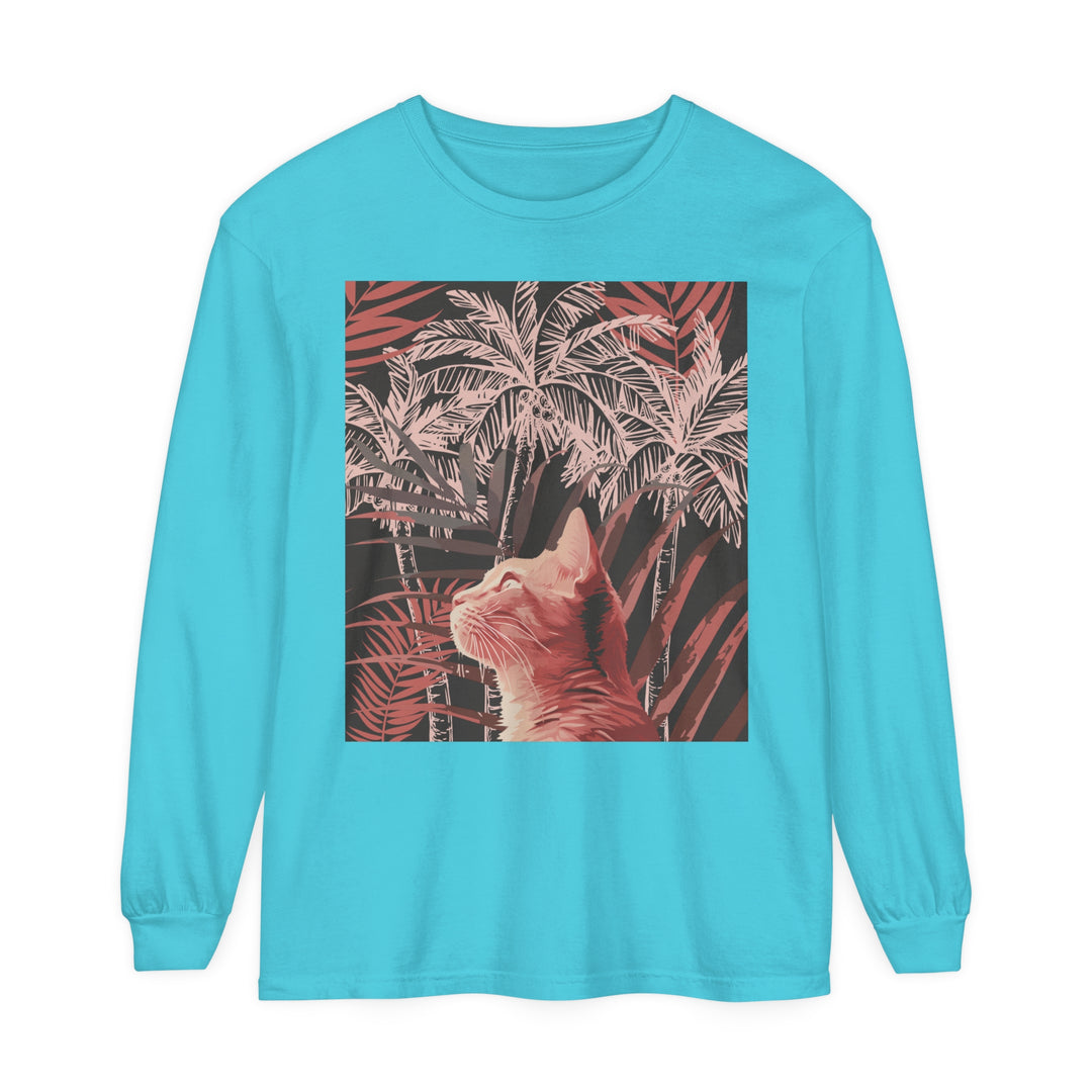 Adorable ginger cat sitting in front of a vibrant palm tree on a t-shirt