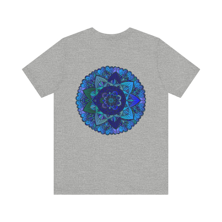 A close-up image of a blue mandala t-shirt with intricate spiritual patterns, promoting peace and harmony