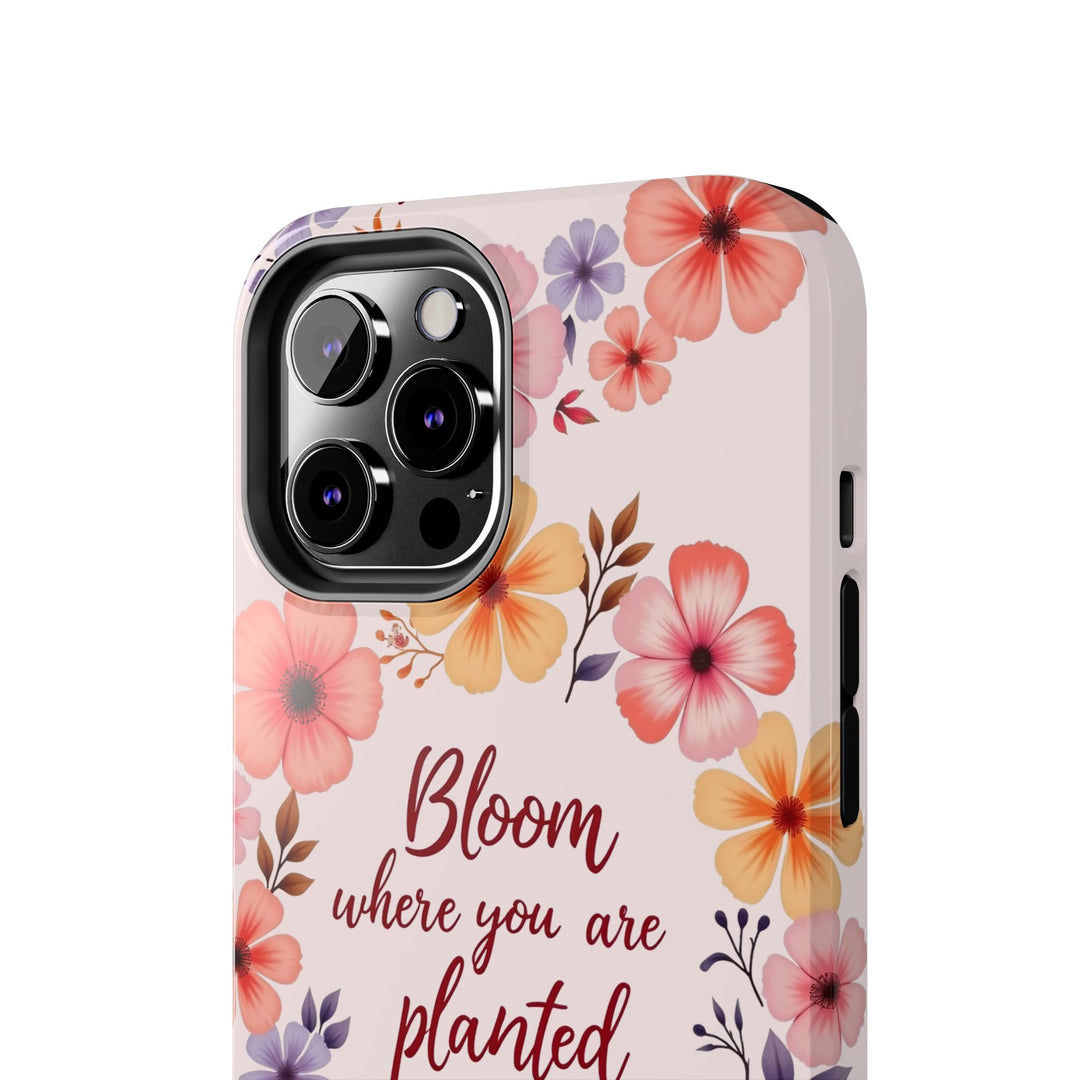 Beautiful light pink phone case with flower garland design, perfect for expressing the message 'bloom where you are planted'