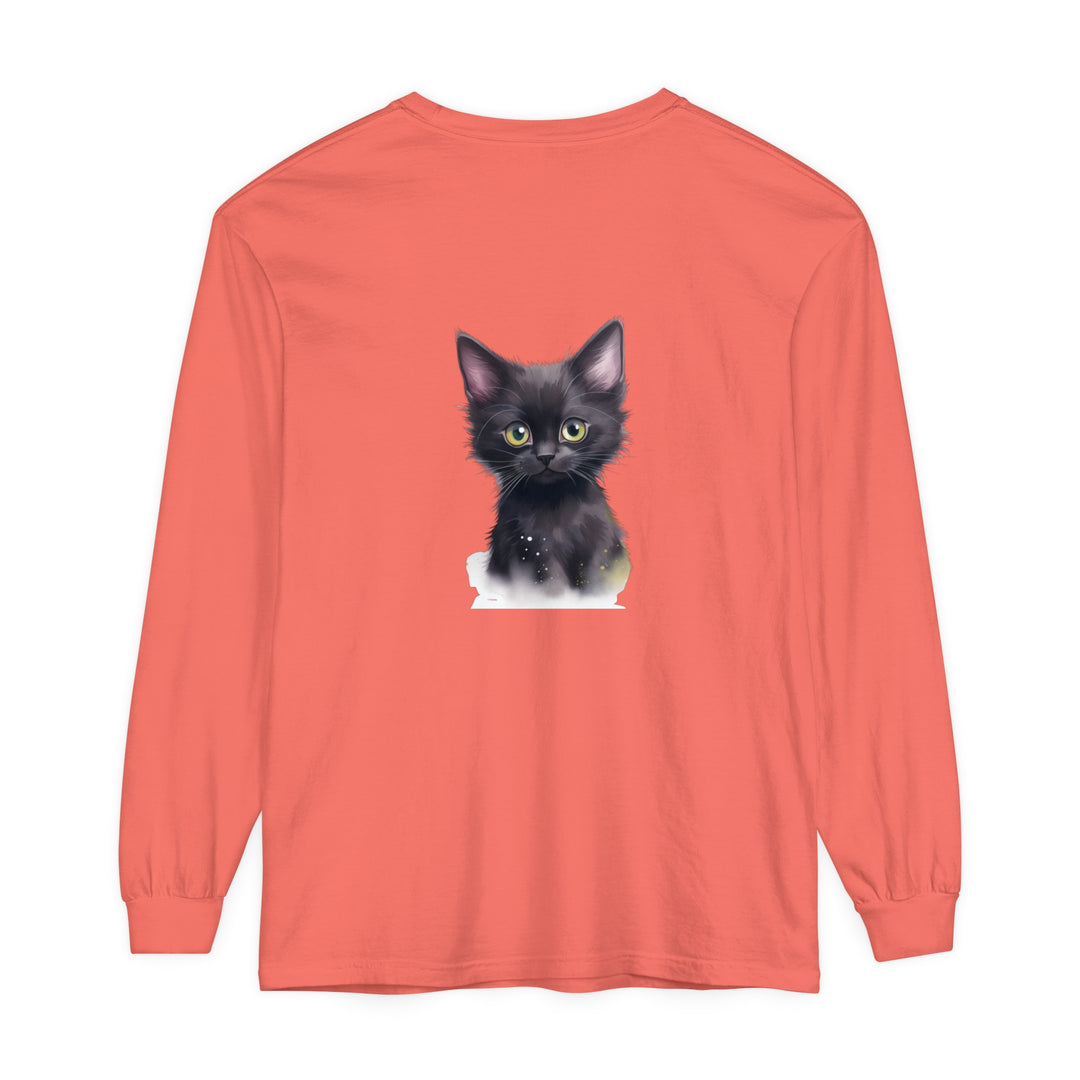 A close-up image of a cute black kitten with bright green eyes printed on a comfortable T-shirt