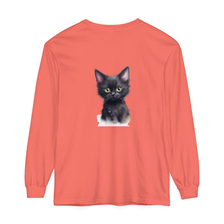 A close-up image of a cute black kitten with bright green eyes printed on a comfortable T-shirt