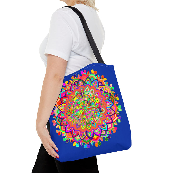 Dark blue tote bag featuring a colorful mandala art design, perfect for carrying your essentials in style