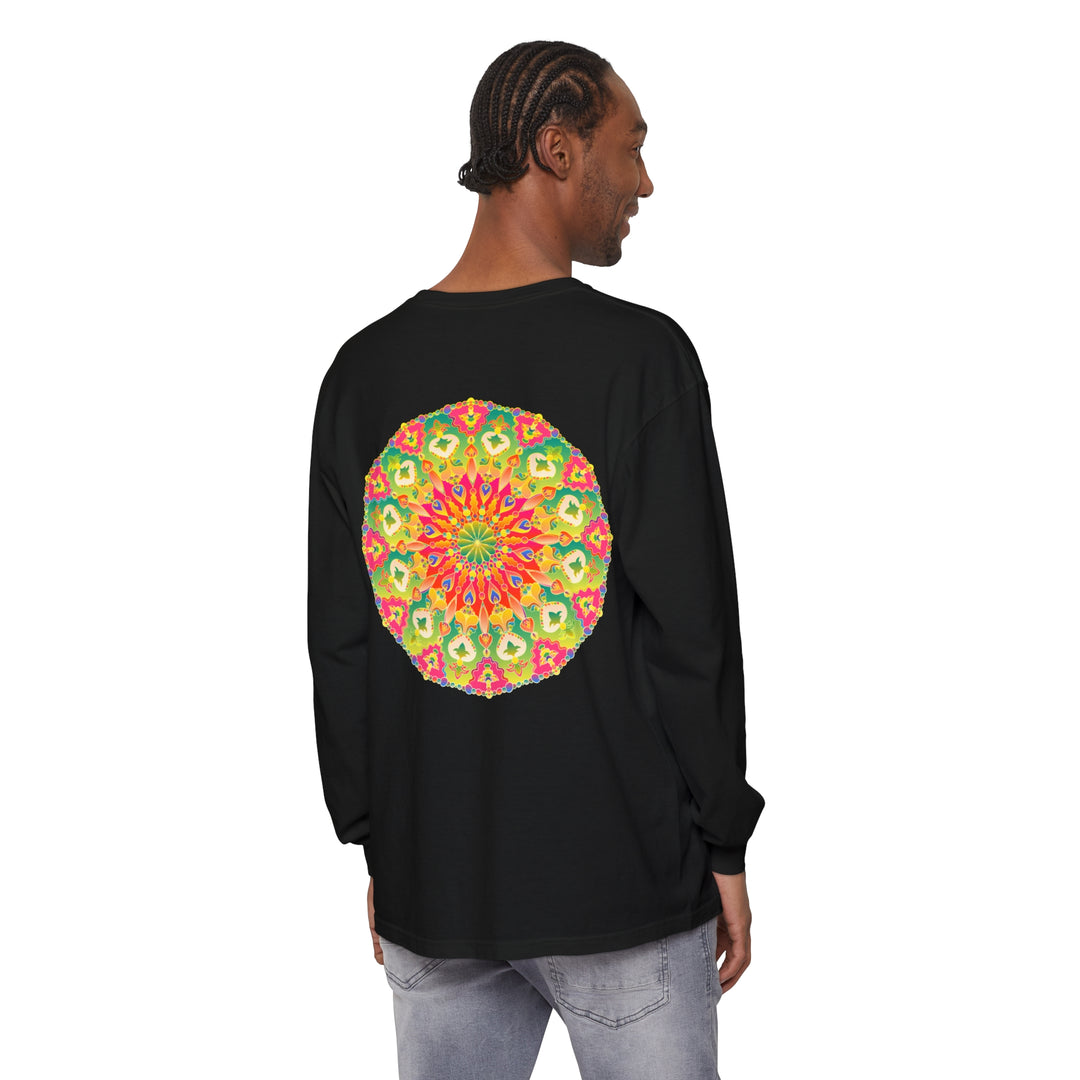 A close-up image of a vibrant, intricate mandala long sleeve t-shirt, featuring detailed and colorful art design