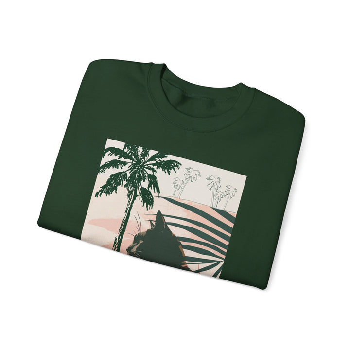 A cozy unisex heavy blend crewneck sweatshirt featuring a cat resting under palm trees