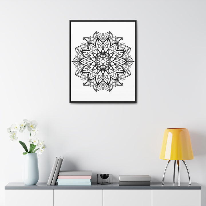 Beautiful mandala handmade art in black and white, displayed on gallery canvas wraps in a vertical frame