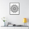 Beautiful mandala handmade art in black and white, displayed on gallery canvas wraps in a vertical frame