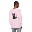 A colorful and vibrant watercolor illustration of a playful kitten surrounded by flowers on a stylish t-shirt