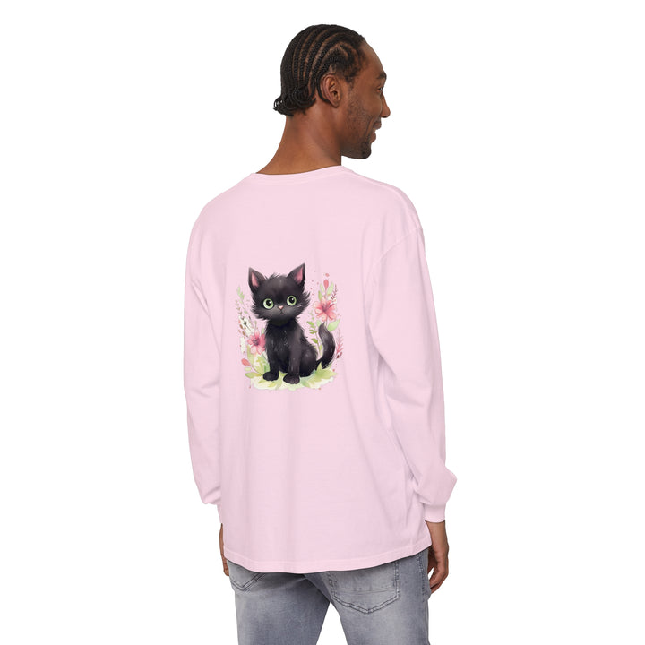 A colorful and vibrant watercolor illustration of a playful kitten surrounded by flowers on a stylish t-shirt