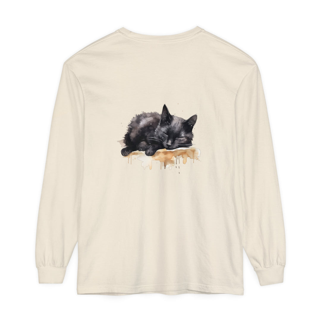 A detailed watercolor illustration of a peaceful black cat sleeping on a t-shirt