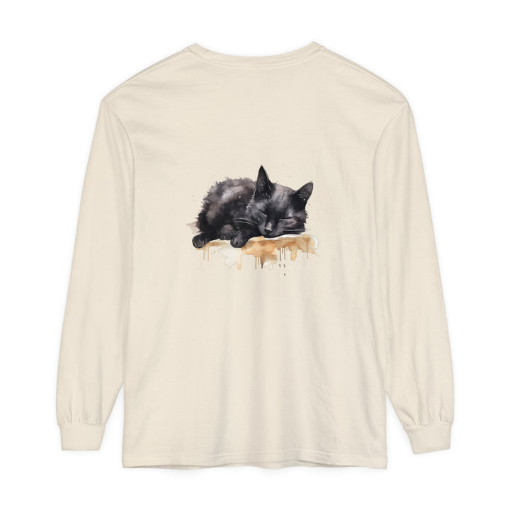 A detailed watercolor illustration of a peaceful black cat sleeping on a t-shirt