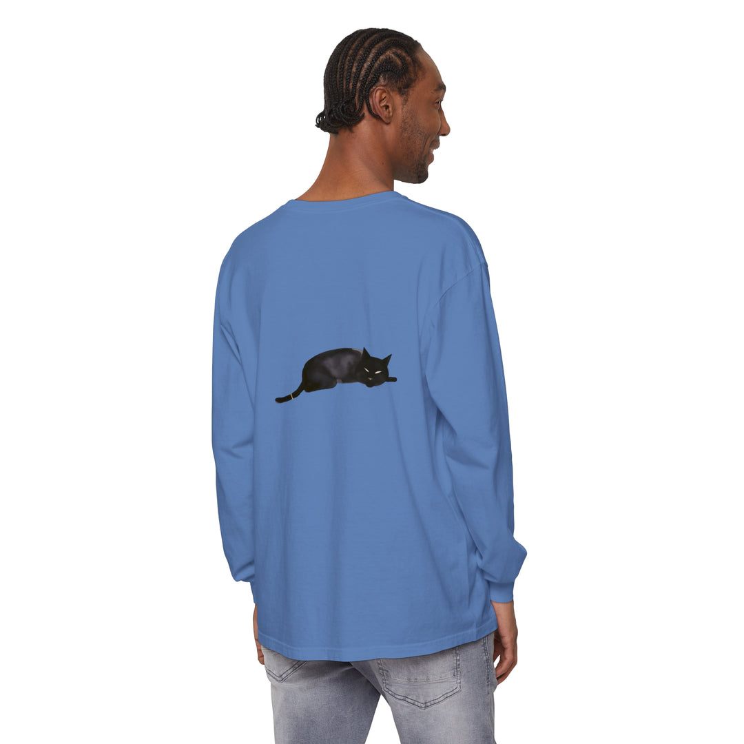 A cozy black cat sleeping peacefully on a unisex long sleeve t-shirt