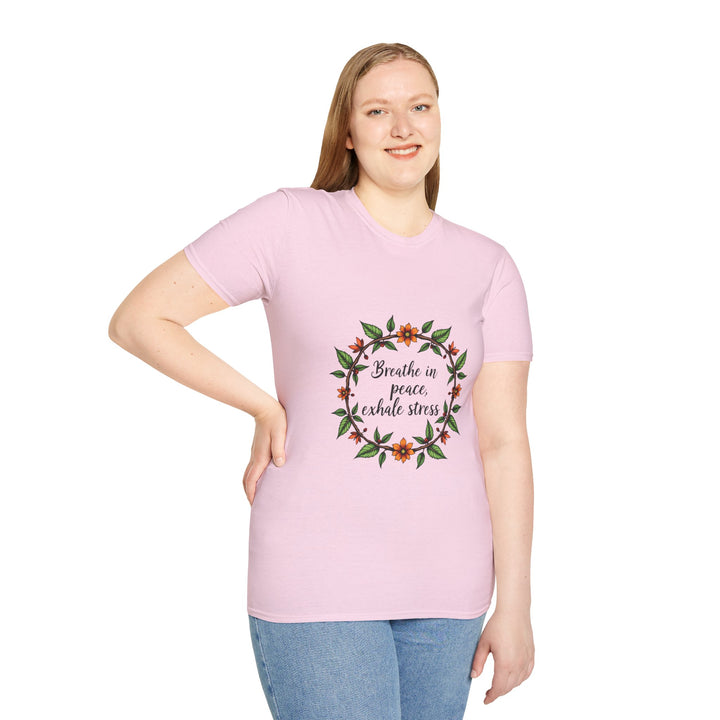 A soft, comfortable white t-shirt with a beautiful floral garland design and the text Breathe in Peace Exhale Stress in delicate cursive font