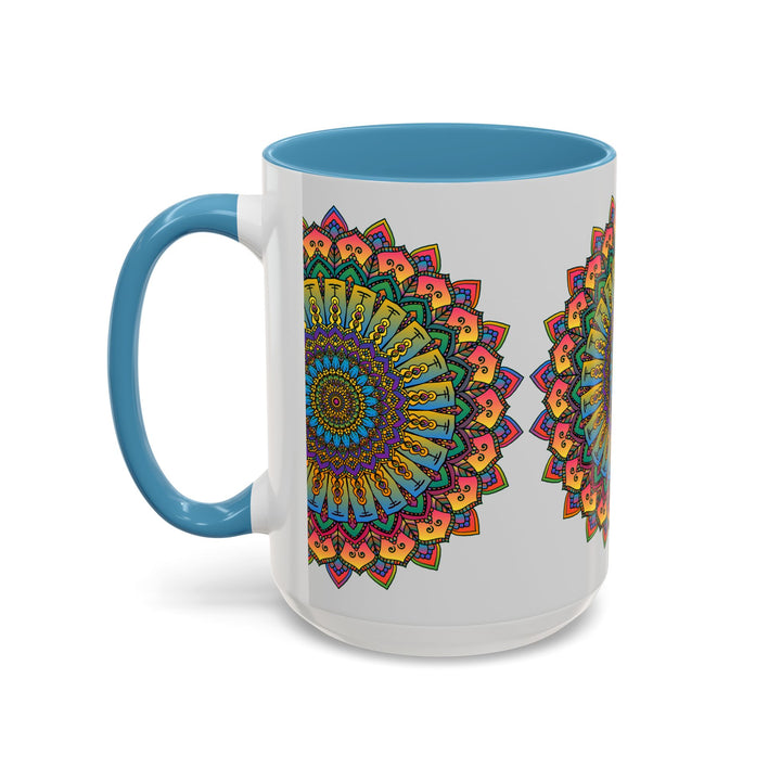 A close-up image of a white ceramic mug with a vibrant mandala art design in various colors, featuring intricate spiritual and colorful patterns