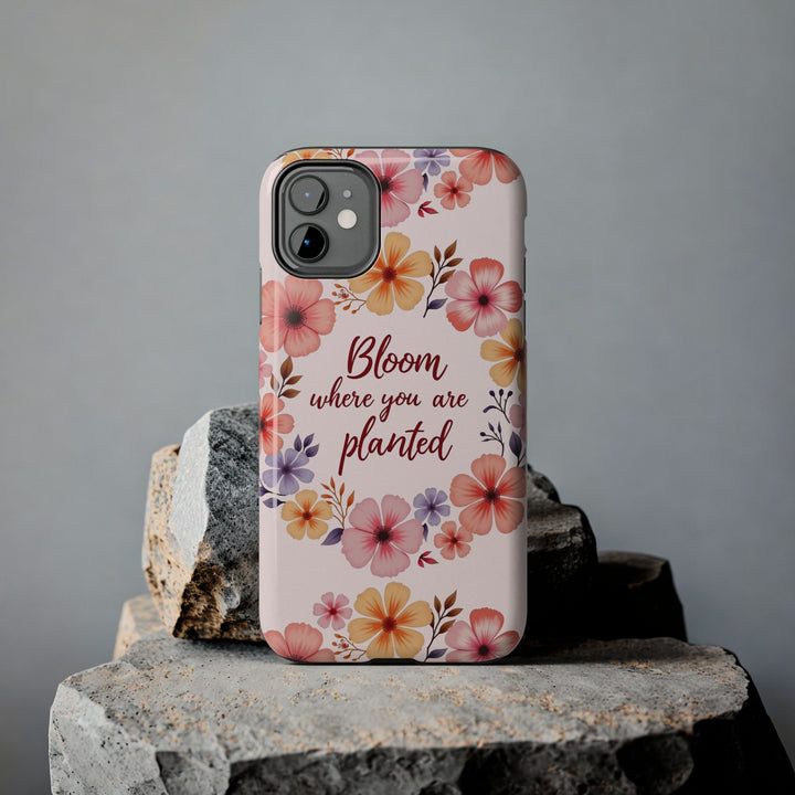 Light pink phone case with a beautiful flower garland design, perfect for adding a touch of nature and elegance to your device