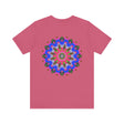 A vibrant mandala tee with intricate spiritual design for peace and harmony