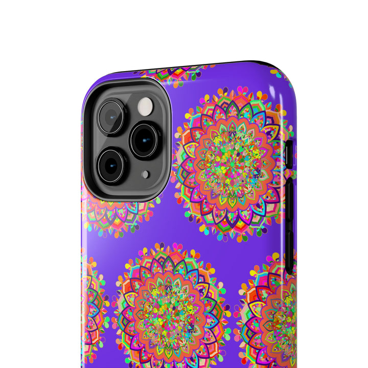 A close-up image of a hand-drawn small purple mandala art phone case designed for iPhone X and XS