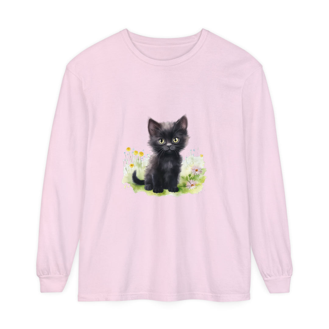 A cute black kitten with bright green eyes sitting in a vibrant flower garden, printed on a soft and comfortable long sleeve t-shirt