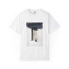 A white short-sleeve crewneck t-shirt featuring a rectangular graphic print of a dark, moody painting depicting a wooden door, a black cat, and a shadow.