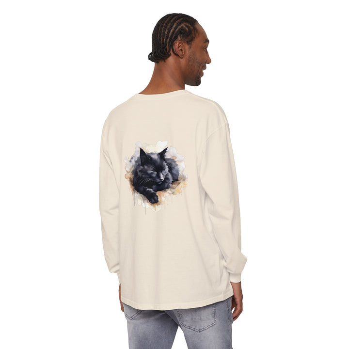 A detailed watercolor illustration of a cute black cat sleeping on a t-shirt