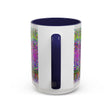 Colorful and ornate mandala design on a grey ceramic mug