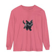 A close-up image of a white t-shirt featuring a watercolor illustration of a playful kitten playing with a ball of yarn, perfect for cat lovers and animal enthusiasts