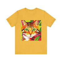 A close-up image of a white short sleeve tee with a colorful striped cat design on the front, known as the Savana Stripes Cat Short Sleeve Tee