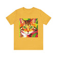 A close-up image of a white short sleeve tee with a colorful striped cat design on the front, known as the Savana Stripes Cat Short Sleeve Tee