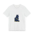 A close-up image of a blue t-shirt with a cool cat design, perfect for cat lovers and mystery enthusiasts