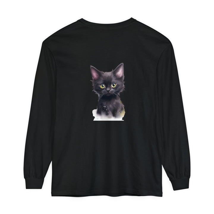 A close-up image of a cute black kitten with bright green eyes printed on a high-quality cotton t-shirt