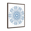 Close up of intricate steel blue mandala design wall art on gallery canvas wraps, displayed in a vertical frame