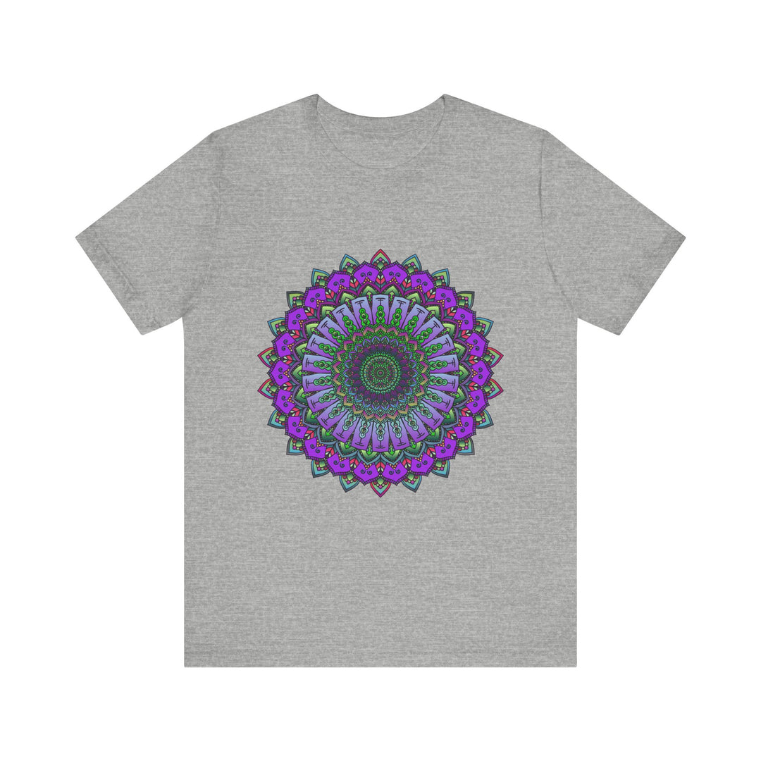 A beautiful purple and green mandala tee featuring an intricate and detailed design