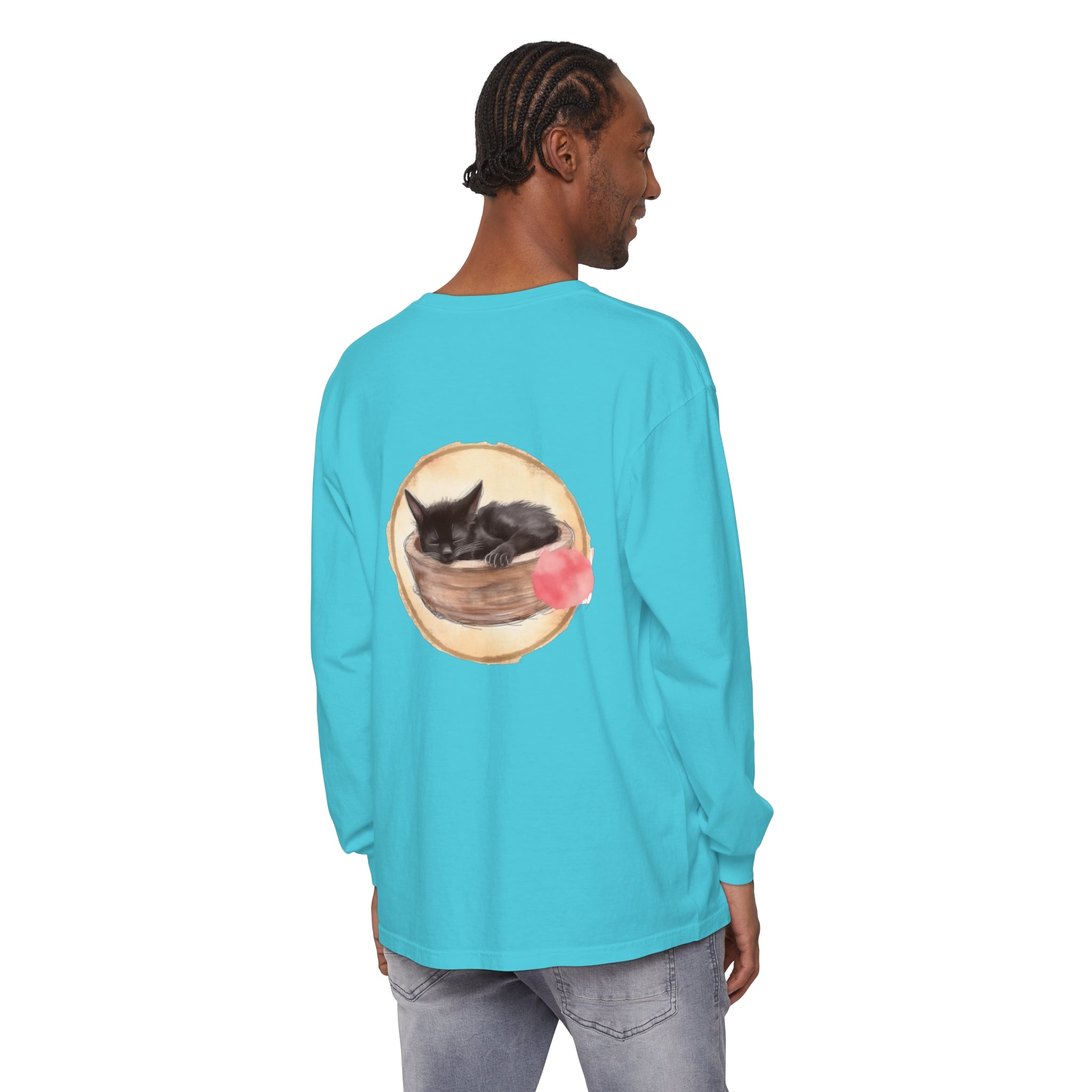 A watercolor illustration of a sleeping cat in a bowl on a long sleeve t-shirt