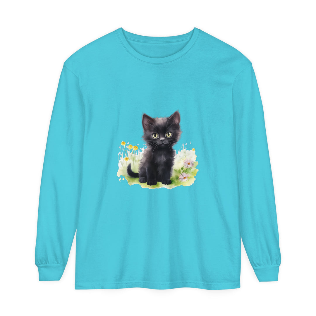 A cute black kitten sitting in a colorful flower garden, printed on a long sleeve t-shirt