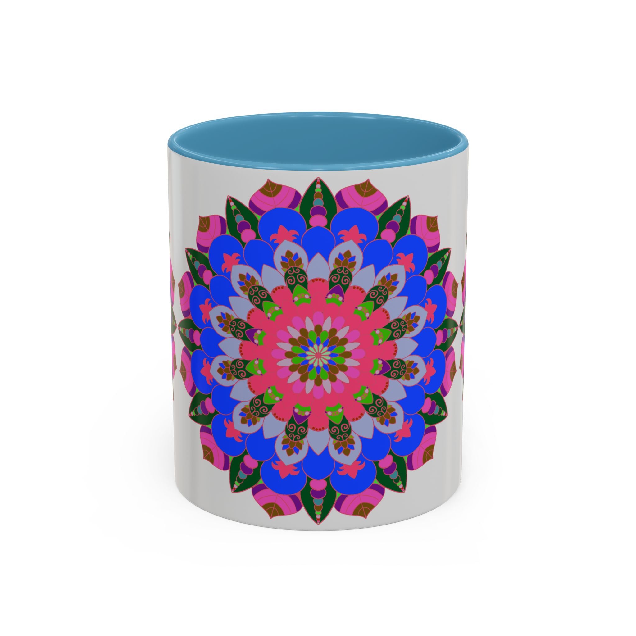 Intricate and colorful mandala pattern on a white mug