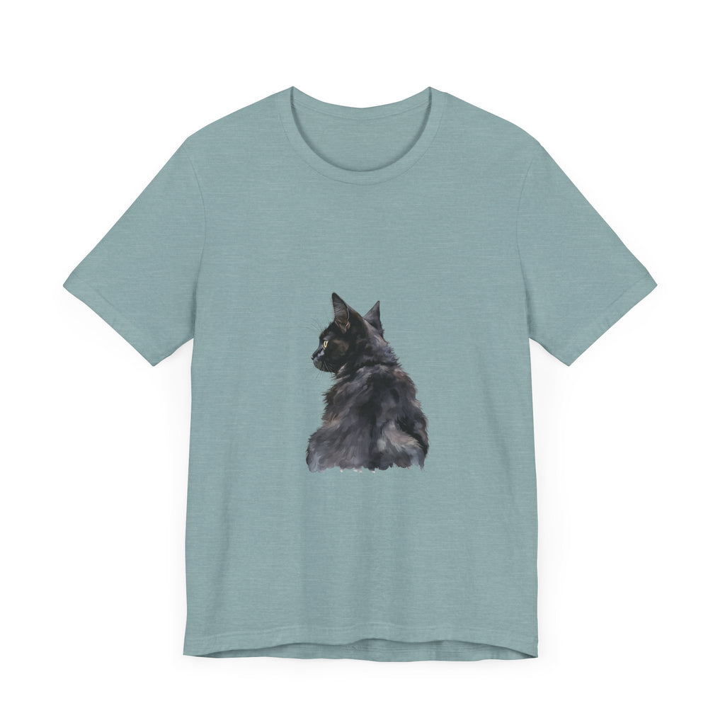 A close-up watercolor illustration of a mysterious black cat on a black t-shirt