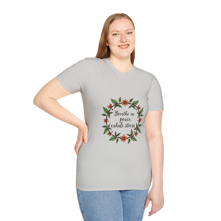 A soft, comfortable white t-shirt with a floral garland design and the words Breathe in Peace Exhale Stress in a calming font