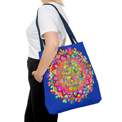 Dark blue tote bag with vibrant and intricate mandala art design