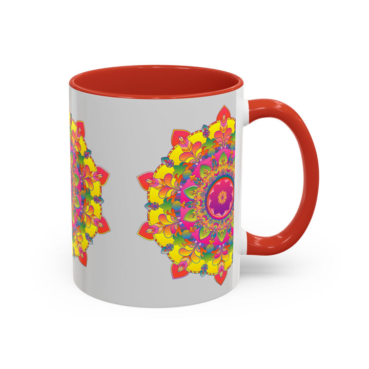 A grey ceramic mug featuring a vibrant mandala design, perfect for enjoying your favorite hot beverages in style