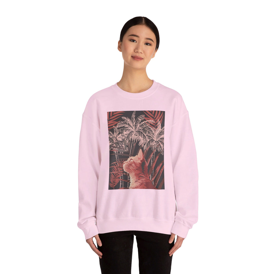 A cozy and stylish unisex heavy blend crewneck sweatshirt featuring a cute cat lounging under palm trees design