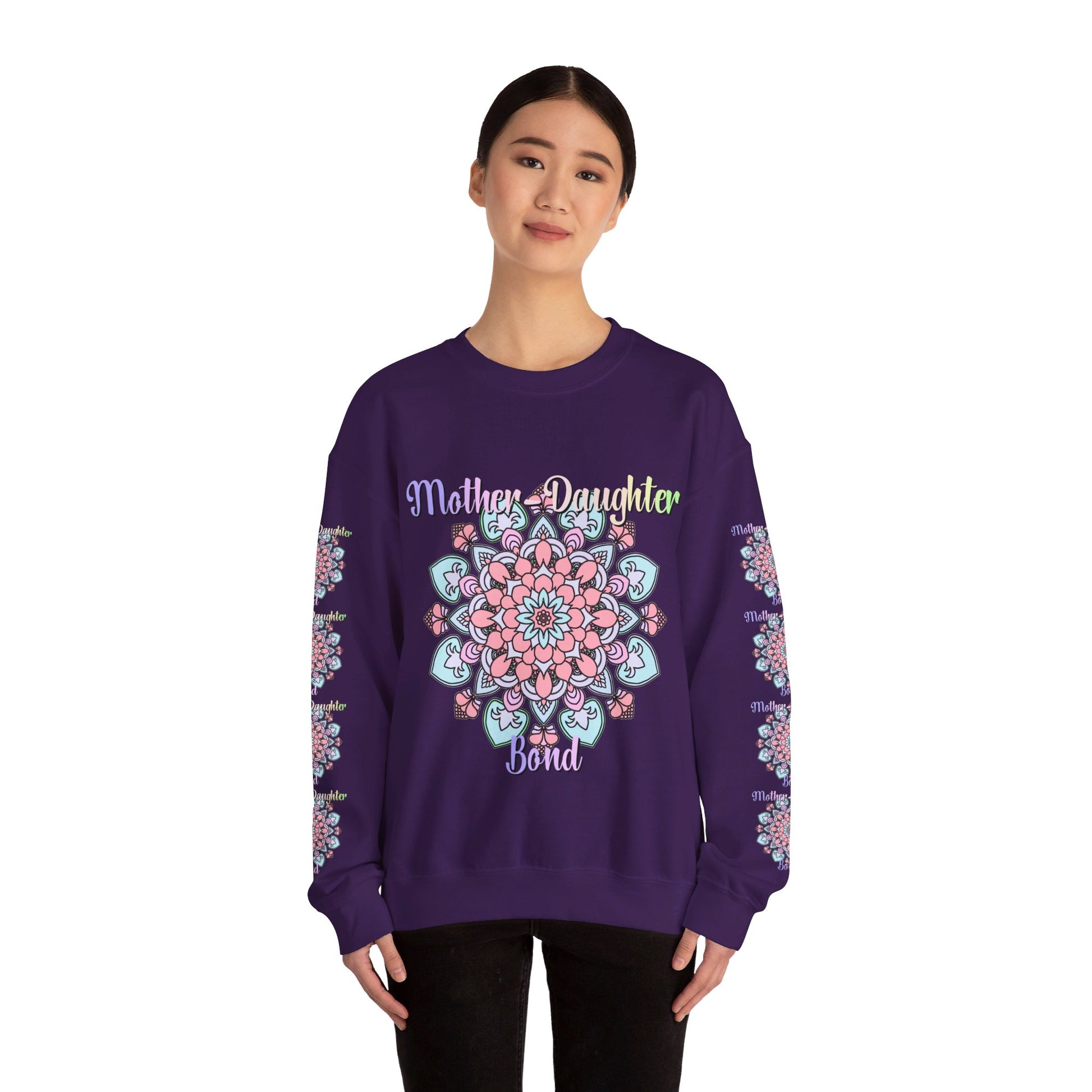 Mother and daughter holding hands in a heartwarming embrace, wearing the 'Mother-Daughter Bond' Unisex Heavy Blend™ Crewneck Sweatshirt - perfect birthday gift for mom